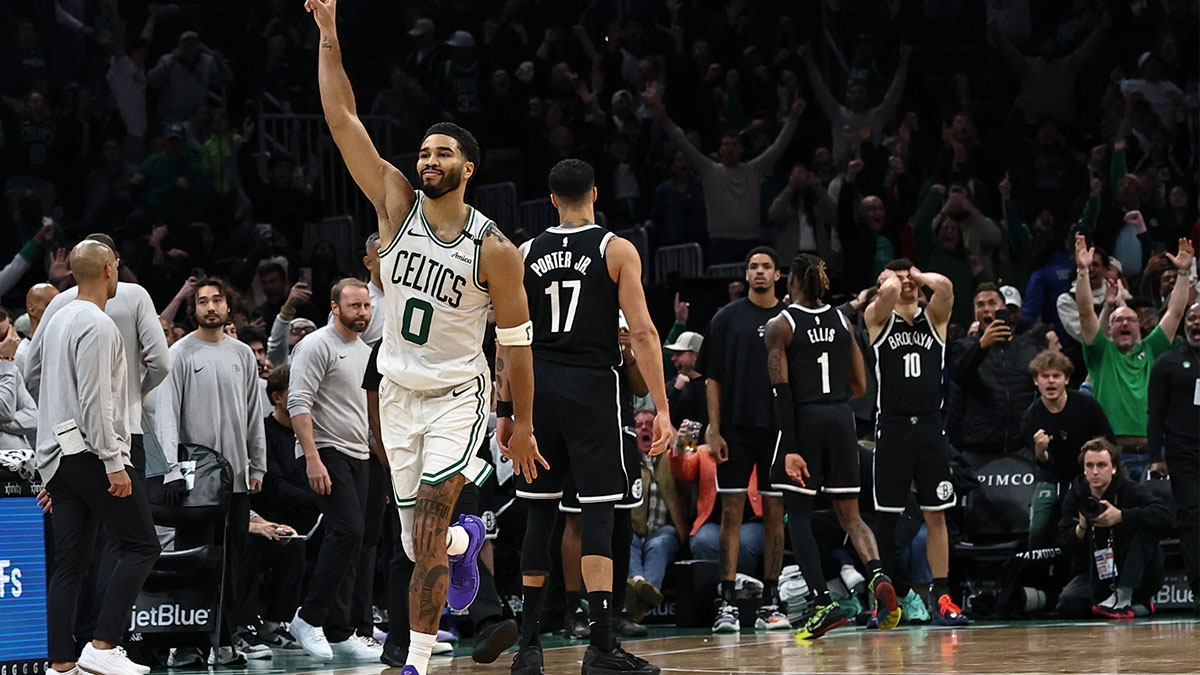 Boston Celtics forward Jayson Tatum (0) celebrates his game winning shot at the end of overtime to defeat the Brooklyn Nets at TD Garden.