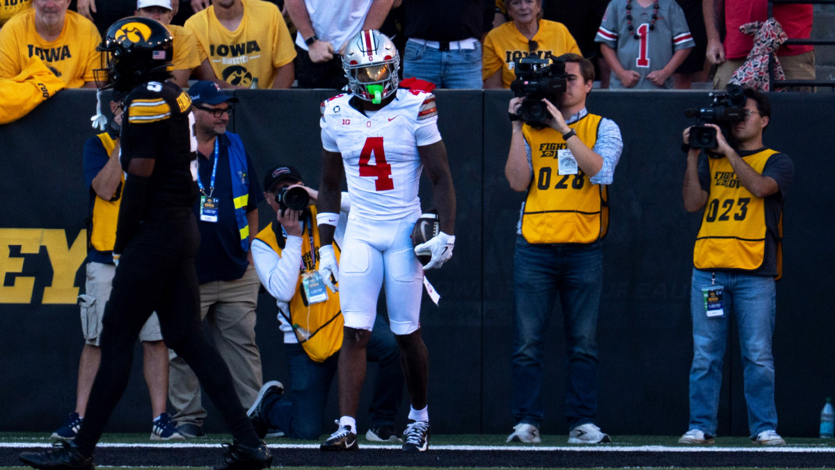 Ohio State Buckeyes wide receiver Jeremiah Smith (4) reacts after scoring a touchdown against the Iowa Hawkeyes during a Big Ten college football game Oct. 3, 2026 at Kinnick Stadium in Iowa City, Iowa.