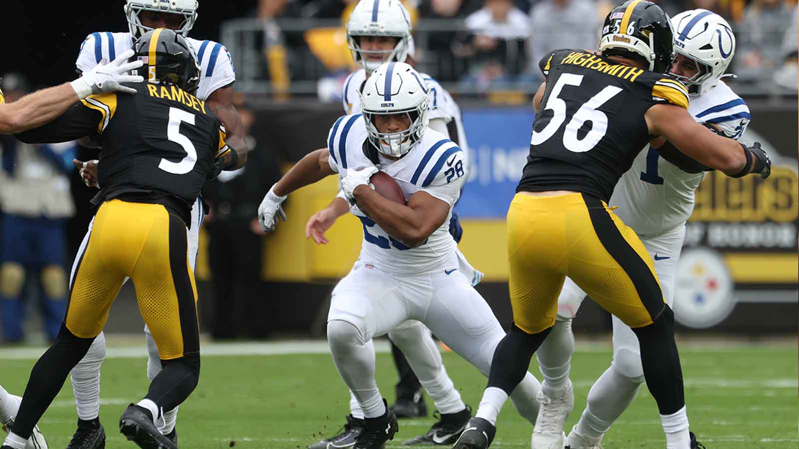 Indianapolis Colts running back Jonathan Taylor (28) runs the ball in the first quarter against the Pittsburgh Steelers at Acrisure Stadium.