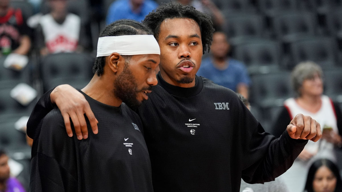 Toronto Raptors forward Kawhi Leonard (left) and forward Scottie Barnes (right) before a game against the New York Knicks at Scotiabank Arena.