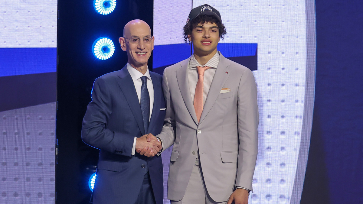 Jun 23, 2026; New York, NY, USA; NBA commissioner Adam Silver greets the fifth pick in the 2026 NBA draft, Illinois guard Keaton Wagler after he was selected by the Los Angeles Clippers at Barclays Center. Mandatory Credit: Brad Penner-Imagn Images