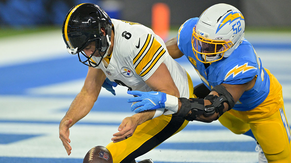 Los Angeles Chargers linebacker Khalil Mack (52) sacks Pittsburgh Steelers quarterback Aaron Rodgers (8) for a safety during the first quarter of the game at SoFi Stadium.