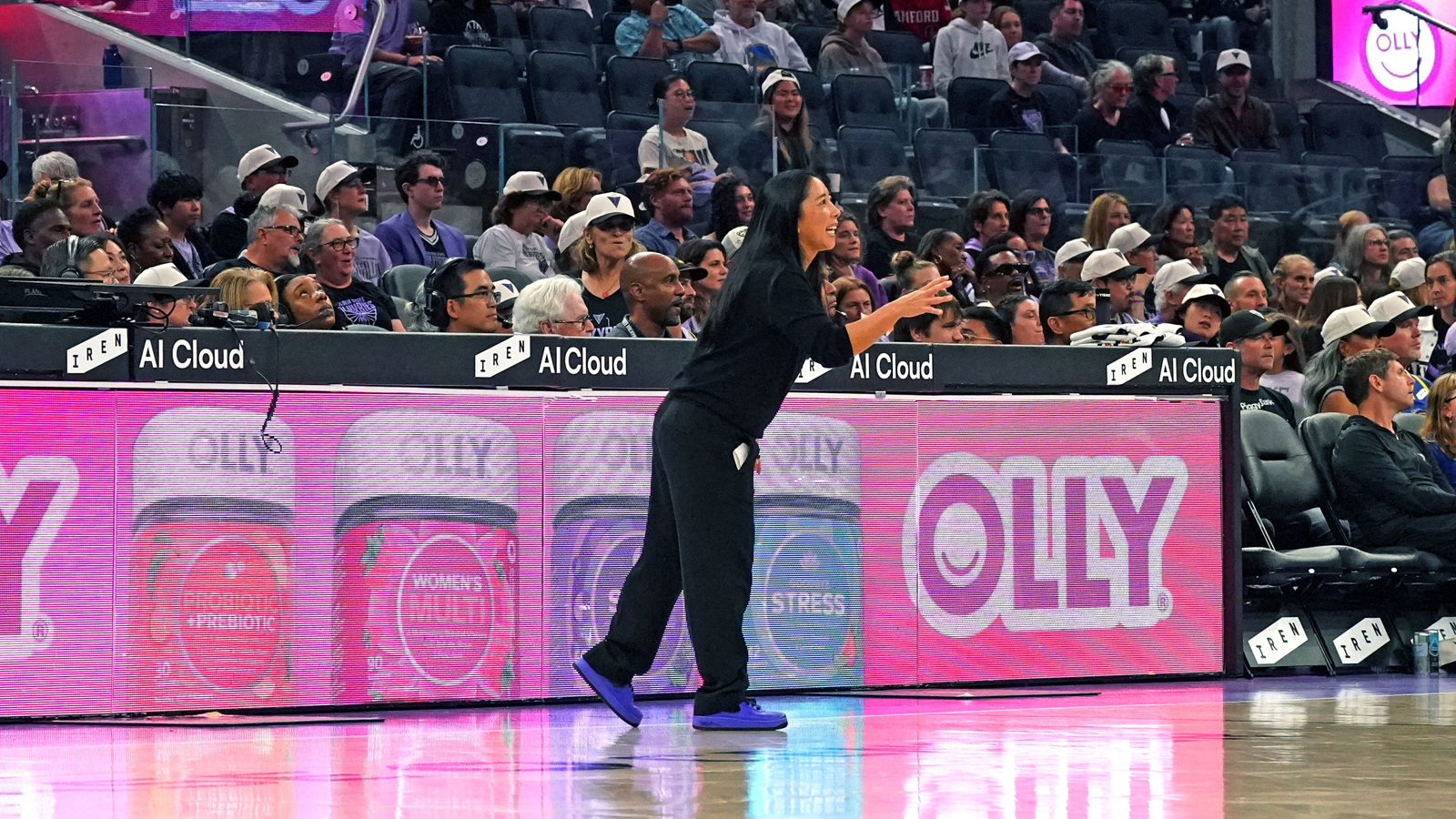 Sep 18, 2026; San Francisco, California, USA; Golden State Valkyries head coach Natalie Nakase coaches the team while standing in front of the Olly digital board and the Iren AI Cloud corporate sponsorship signage during a game against the Portland Fire in the third quarter at Chase Center. Mandatory Credit: David Gonzales-Imagn Images