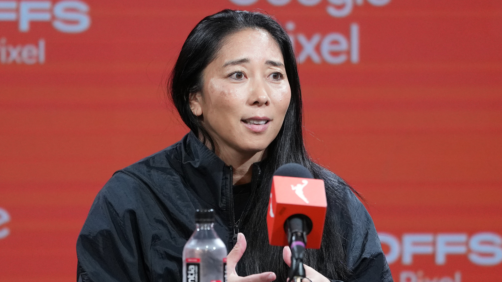 Oct 2, 2026; San Francisco, California, USA; Golden State Valkyries head coach Natalie Nakase talks to media members before game three of the first round for the 2026 WNBA Playoffs at Chase Center. Mandatory Credit: Darren Yamashita-Imagn Images