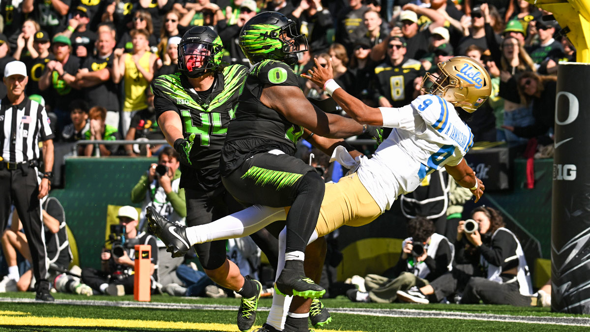 UCLA Bruins quarterback Nico Iamaleava (9) drops back for a pass during the first quarter against the Oregon Ducks at Autzen Stadium.