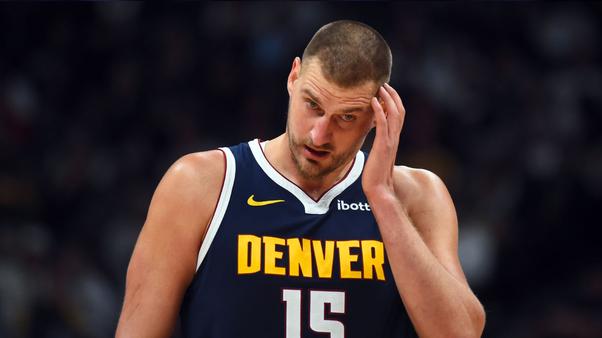 Denver Nuggets center Nikola Jokic (15) walks near mid court during the second half against the New Orleans Pelicans at Ball Arena.