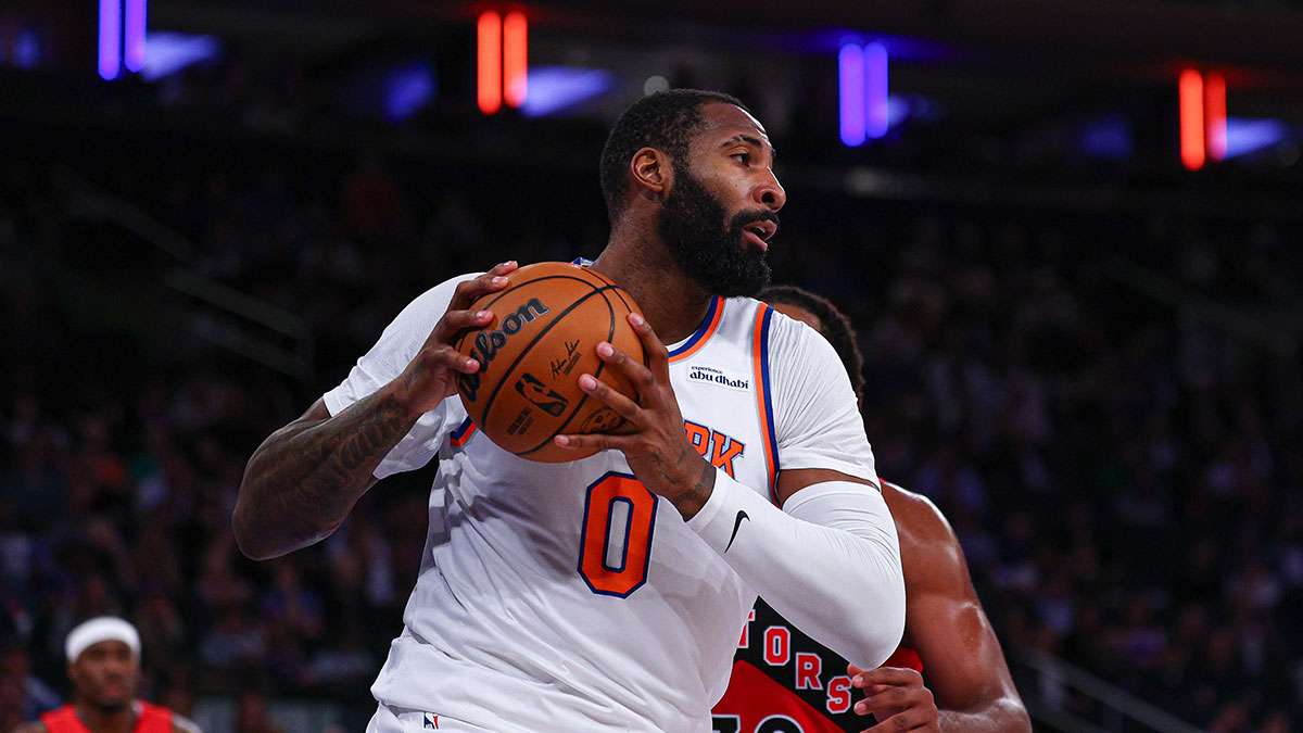 New York Knicks center Andre Drummond (0) rebounds during the first half against the Toronto Raptors at Madison Square Garden. Mandatory Credit: Vincent Carchietta-Imagn Images