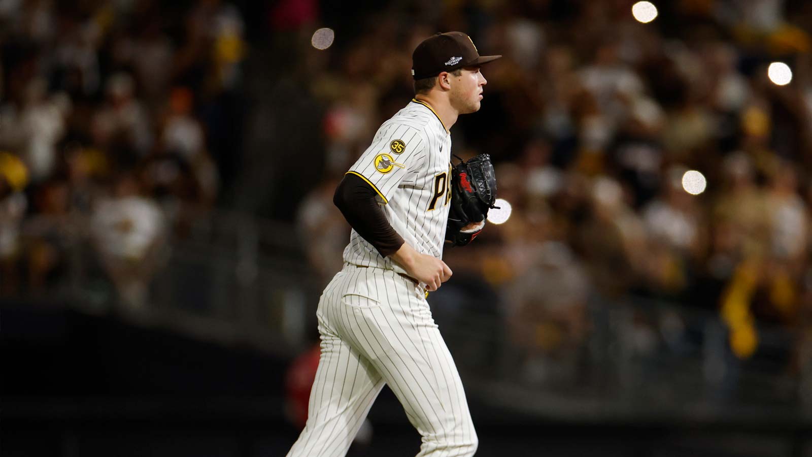 San Diego Padres pitcher Mason Miller (22) takes the field during the seventh inning against the Milwaukee Brewers in game four of the NLDS for the 2026 MLB Playoffs at Petco Park.