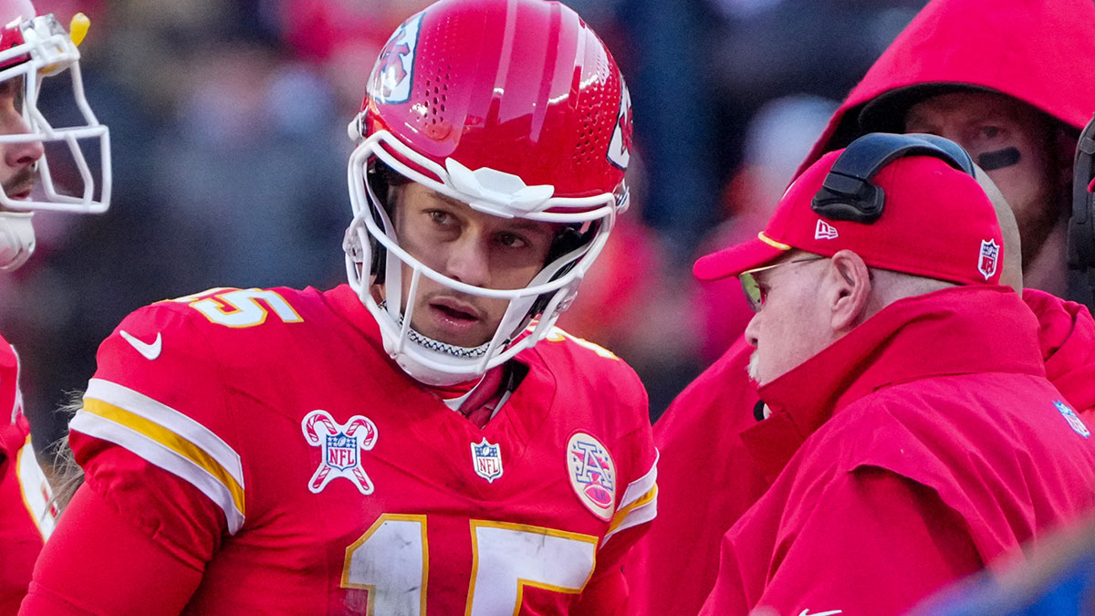 Kansas City Chiefs quarterback Patrick Mahomes (15) talks with head coach Andy Reid during the second half against the Houston Texans at GEHA Field at Arrowhead Stadium.