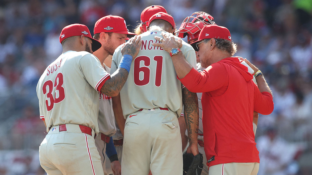 Philadelphia Phillies interim manager Don Mattingly (8) visits the mound in the seventh inning against the Atlanta Braves during game two of the Wildcard round for the 2026 MLB Playoffs at Truist Park.