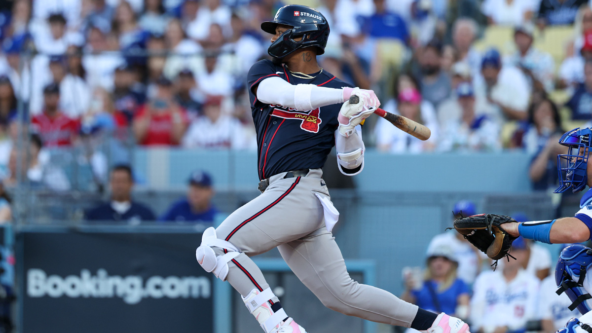 Atlanta Braves outfielder Ronald Acuna Jr. (13) singles during the first inning against the Los Angeles Dodgers in game two of the NLDS for the 2026 MLB Playoffs at Uniqlo Field at Dodger Stadium.