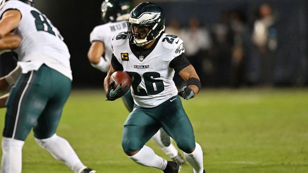 Philadelphia Eagles running back Saquon Barkley (26) runs against the Chicago Bears during the first half at Soldier Field.