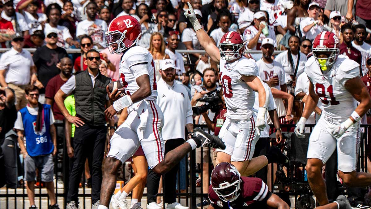 Alabama quarterback Keelon Russell (12) carries the ball for a touchdown during a college football game between Mississippi State and Alabama at Davis Wade Stadium in Starkville, Miss., on Saturday, Oct. 3, 2026. Alabama defeated Mississippi State 56-23.