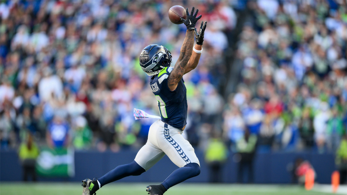Seattle Seahawks wide receiver Jaxon Smith-Njigba (11) leaps but cannot catch a pass thrown by quarterback Sam Darnold (not pictured) against the San Francisco 49ers during the fourth quarter at Lumen Field.