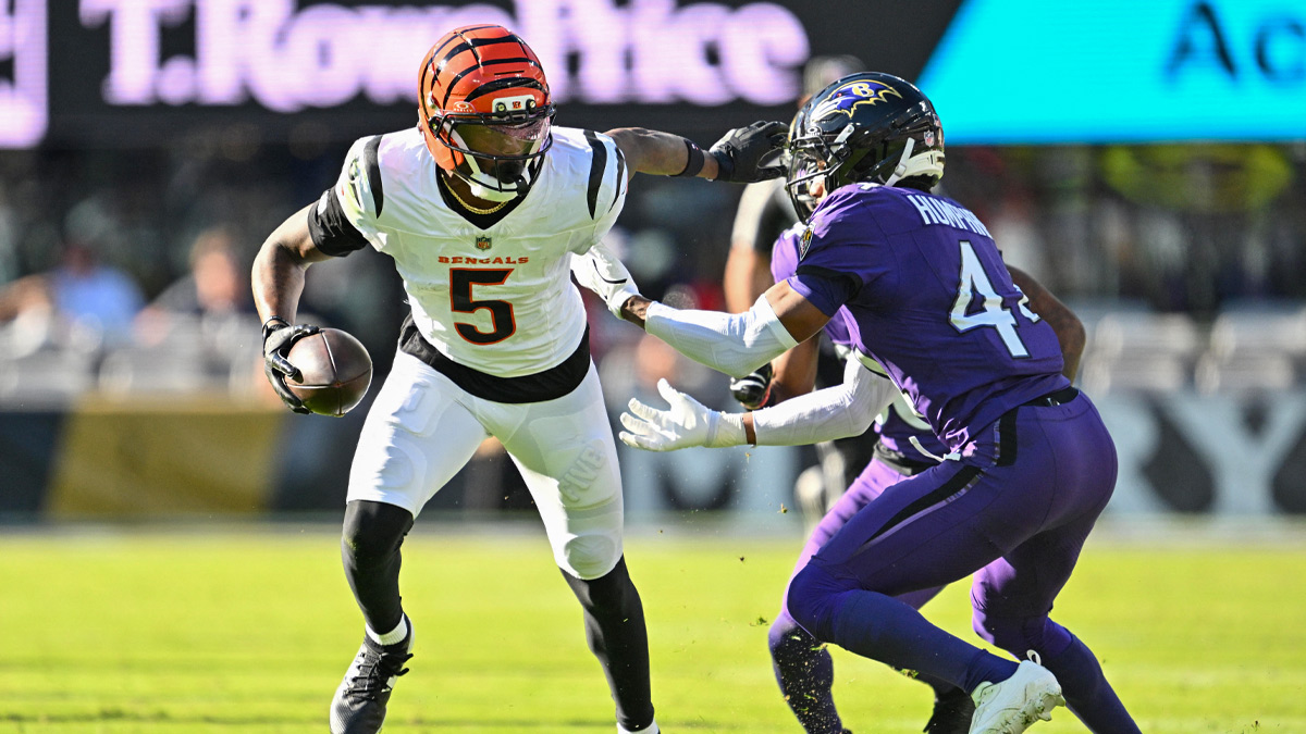Cincinnati Bengals wide receiver Tee Higgins (5) runs the ball after a pass reception during the second half against the Baltimore Ravens at M&T Bank Stadium.