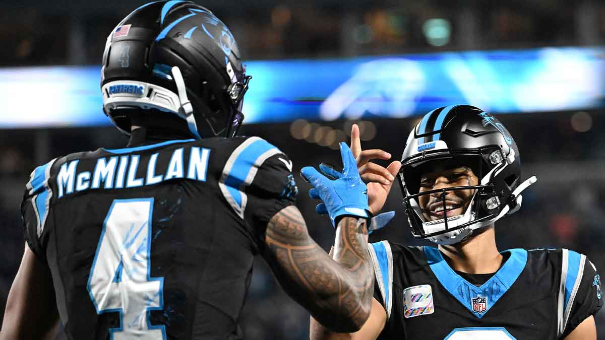 Oct 4, 2026; Charlotte, North Carolina, USA; Carolina Panthers wide receiver Tetairoa McMillan (4) celebrates with quarterback Bryce Young (9) after scoring a touchdown against the Detroit Lions during the third quarter at Bank of America Stadium.