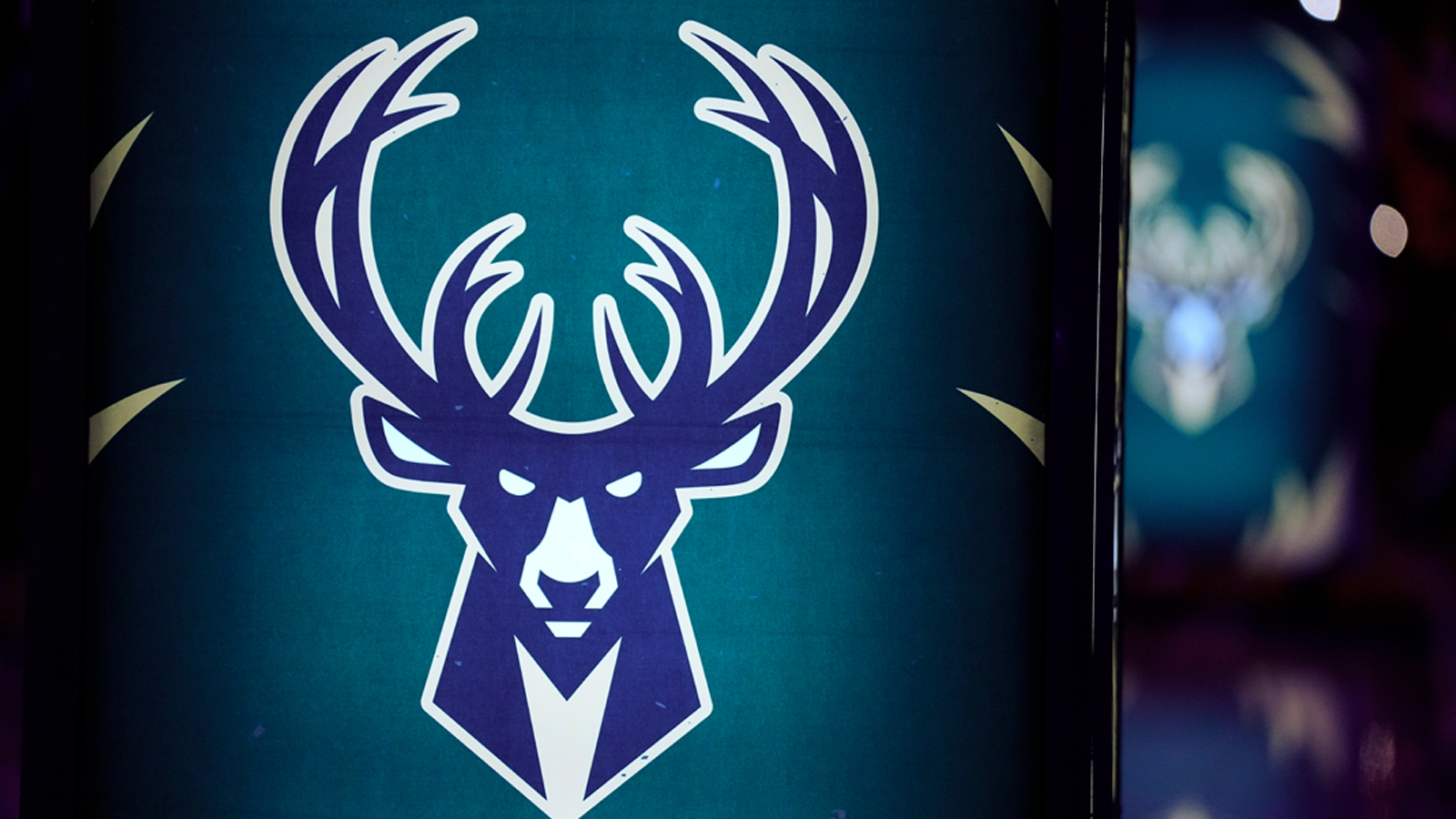 https://wp.clutchpoints.com/wp-content/uploads/2026/10/The-Milwaukee-Bucks-logo-displayed-inside-Fiserv-Forum.jpg
