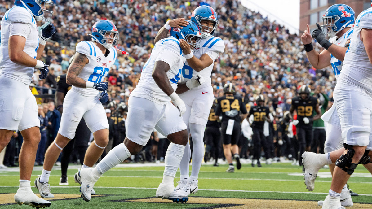 Mississippi Rebels defensive tackle Jamarious Brown (96) celebrates with Mississippi Rebels quarterback Trinidad Chambliss (6) during the game between Old Miss and Vanderbilt at FirstBank Stadium in Nashville on Saturday, October. 10, 2026.