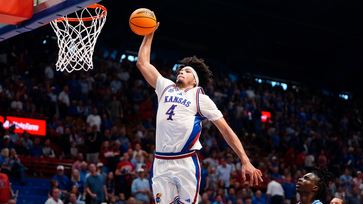 Kansas Jayhawks guard Tyran Stokes (4) jumps for a dunk against Duke Blue Devils during the exhibition game inside Allen Fieldhouse in Lawrence, Kansas on Oct. 25, 2026.