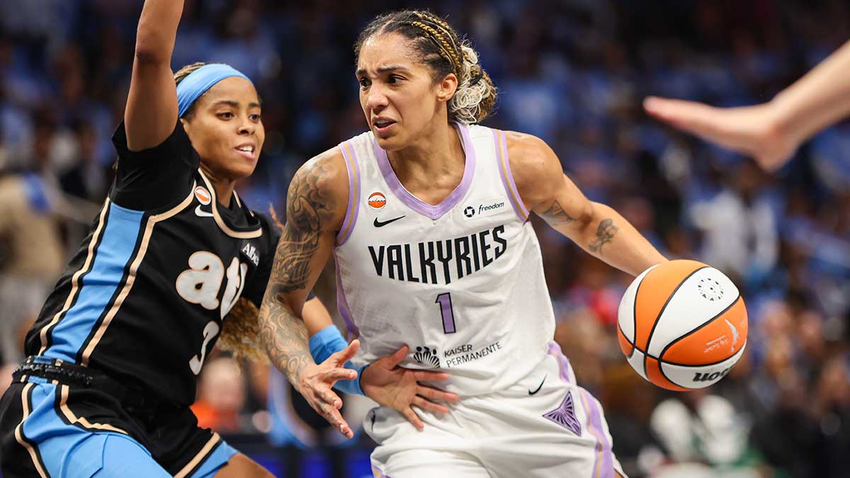 Golden State Valkyries forward Gabby Williams (1) drives on Atlanta Dream guard Jordin Canada (3) in the fourth quarter during game three of the 2026 WNBA Finals at State Farm Arena.