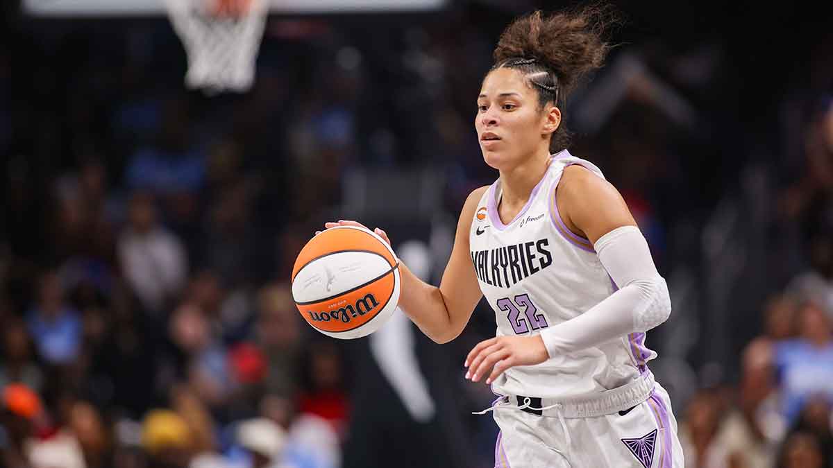 Golden State Valkyries guard Veronica Burton (22) dribbles against the Atlanta Dream in the third quarter during game six of the 2026 WNBA Finals at State Farm Arena.