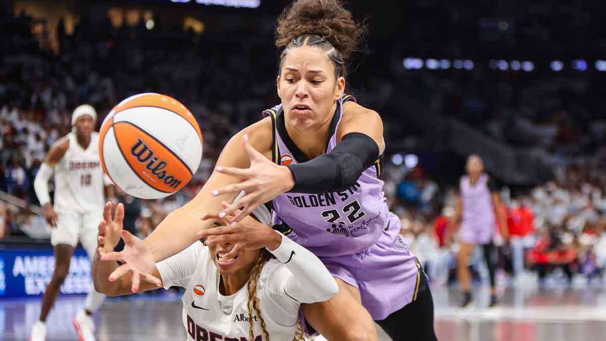 Oct 24, 2026; Atlanta, Georgia, USA; Golden State Valkyries guard Veronica Burton (22) and Atlanta Dream guard Jordin Canada (3) dive for a loose ball in the fourth quarter during game four of the 2026 WNBA Finals at State Farm Arena. Mandatory Credit: Brett Davis-Imagn Images