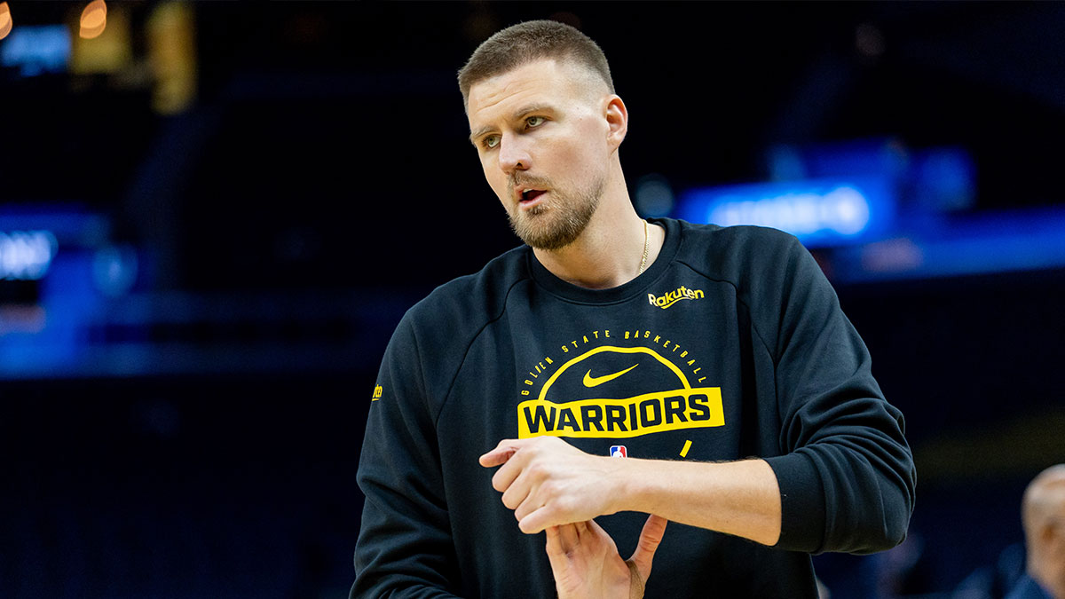 Golden State Warriors center Kristaps Porzingis (7) warms up before the game at Chase Center.