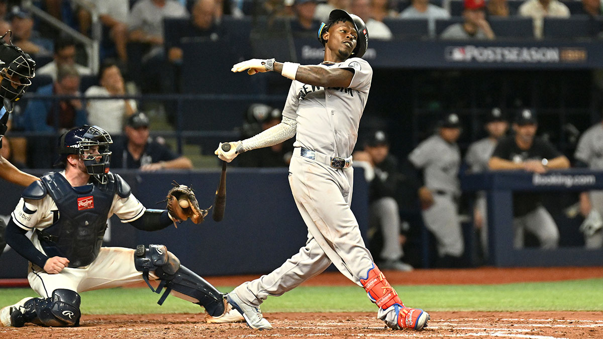 New York Yankees second baseman Jazz Chisholm Jr. (13) is out on a batted ball during the fifth inning against the Tampa Bay Rays in game two of the ALDS for the 2026 MLB Playoffs at Tropicana Field.