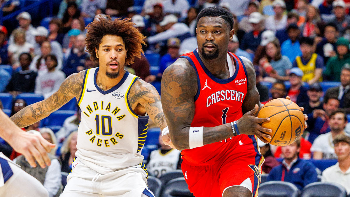 New Orleans Pelicans forward Zion Williamson (1) dribbles against Indiana Pacers guard Kelly Oubre Jr. (10) during the second half at Smoothie King Center.