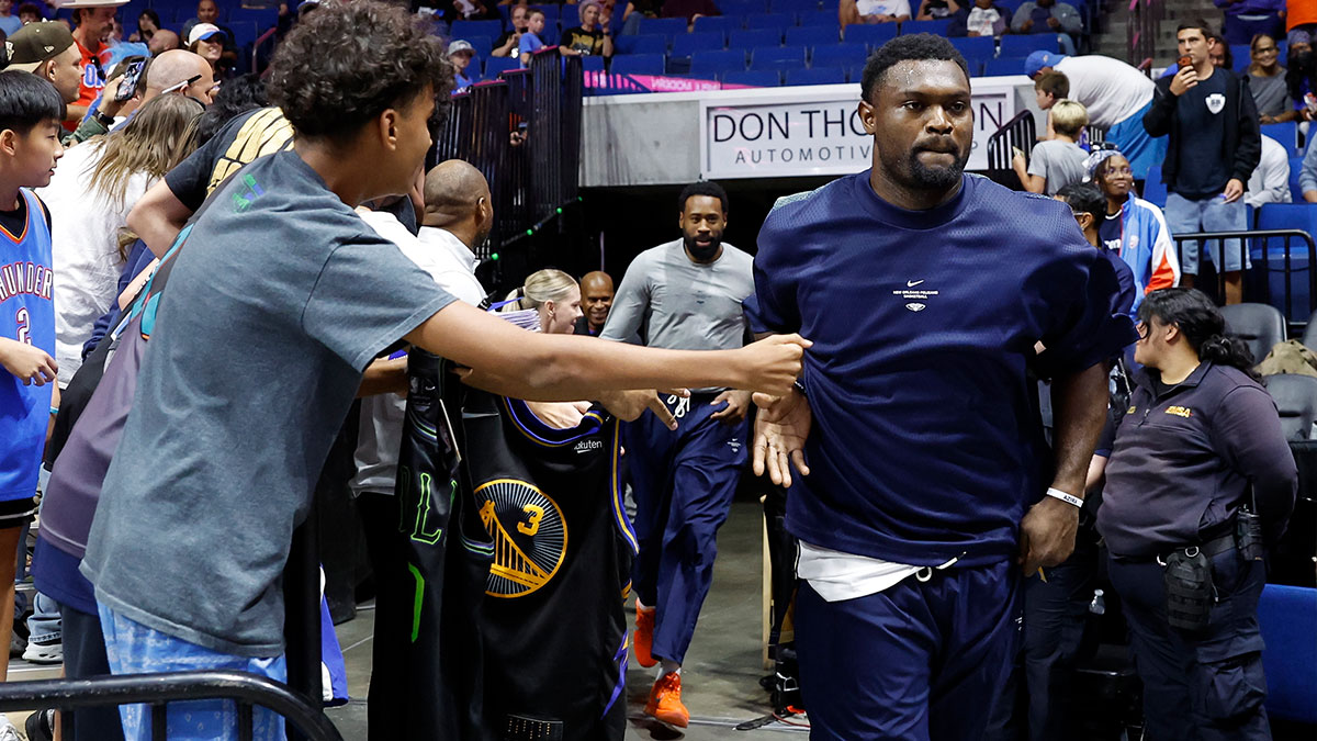 New Orleans Pelicans forward Zion Williamson (1) runs out of the tunnel before a preseason game against the Oklahoma City Thunder at BOK Center.